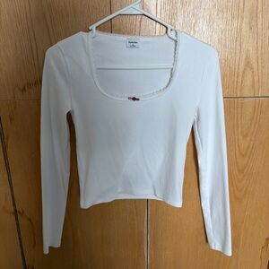 Aritzia White Long Sleeve Top with Flower Accent